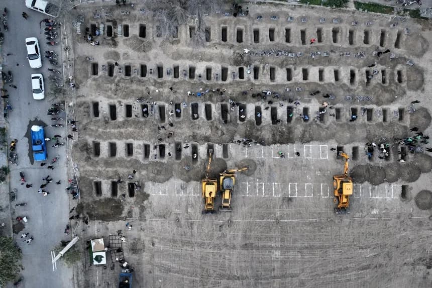 Graves being prepared March 2 for the victims, mostly children, of the Feb. 28 strike in a photo released by the Iranian government's foreign media department and distributed by The Associated Press without changes. Photo: AP