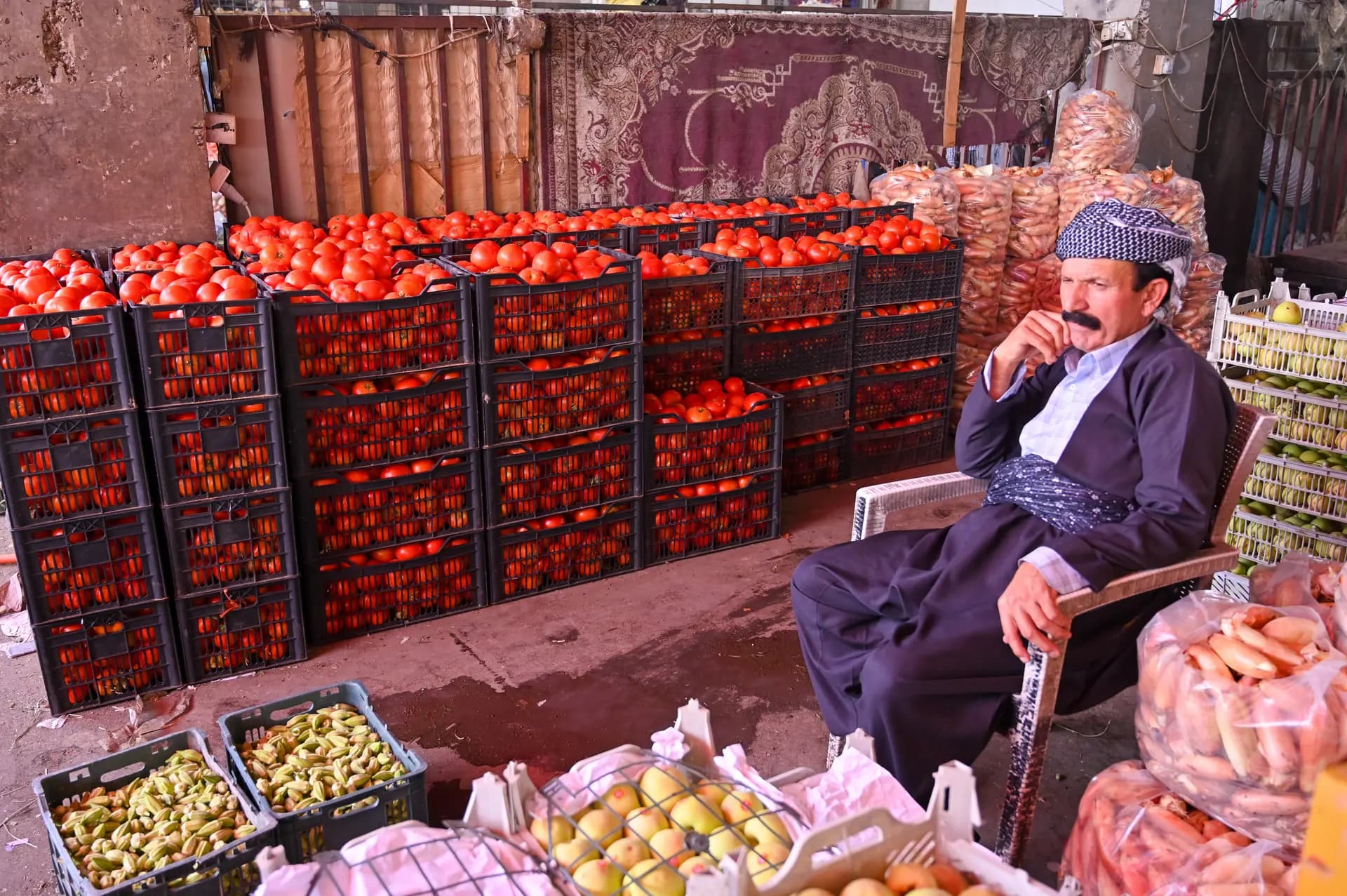 An undated photo of a trader who waits for customers at Erbil's wholesale market. Photo: Rudaw