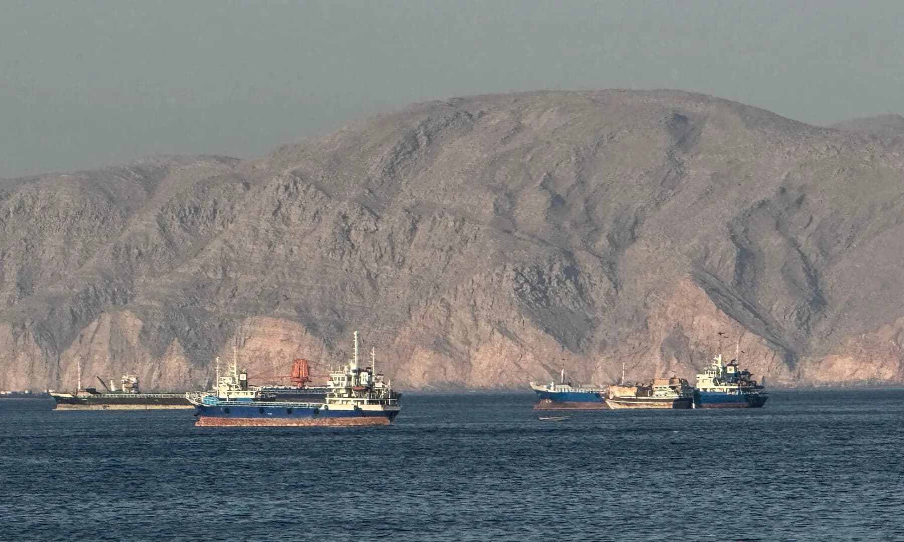 Ships anchored in the Strait of Hormuz, off the port city of Khasab on Oman’s northern Musandam Peninsula on May 17, 2026. Photo: AFP.