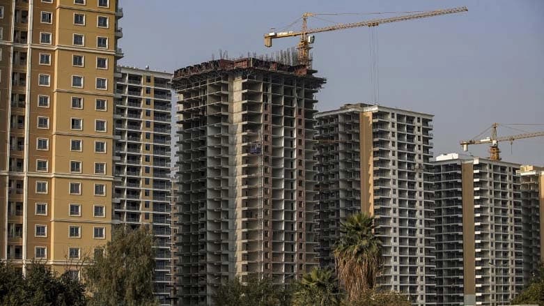 A photograph of unfinished apartment buildings in Iraq's capital Baghdad, Dec. 16, 2022. Photo: AFP