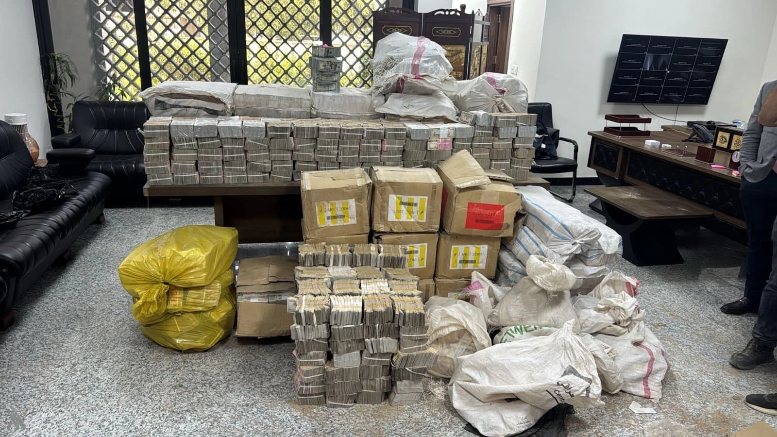 Portion of assets seized in Baghdad's "Operation Dawn" against corruption. Photo: state media