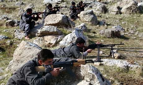 A group of PJAK fighters holding light and heavy guns. Photo: File/AP