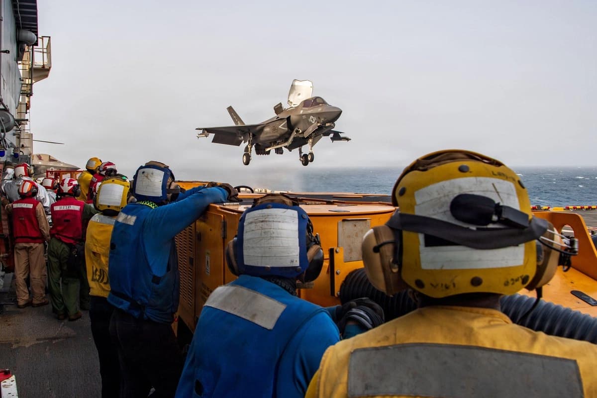 US service members aboard amphibious assault ship USS Boxer (LHD 4) support flight operations from the Arabian Sea against Iran. Photo: CENTCOM
