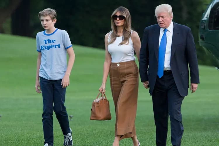 Barron Trump, Melania Trump û Donald Trump / Wêne: Chris Kleponis—Pool/Getty Images-Arşîv