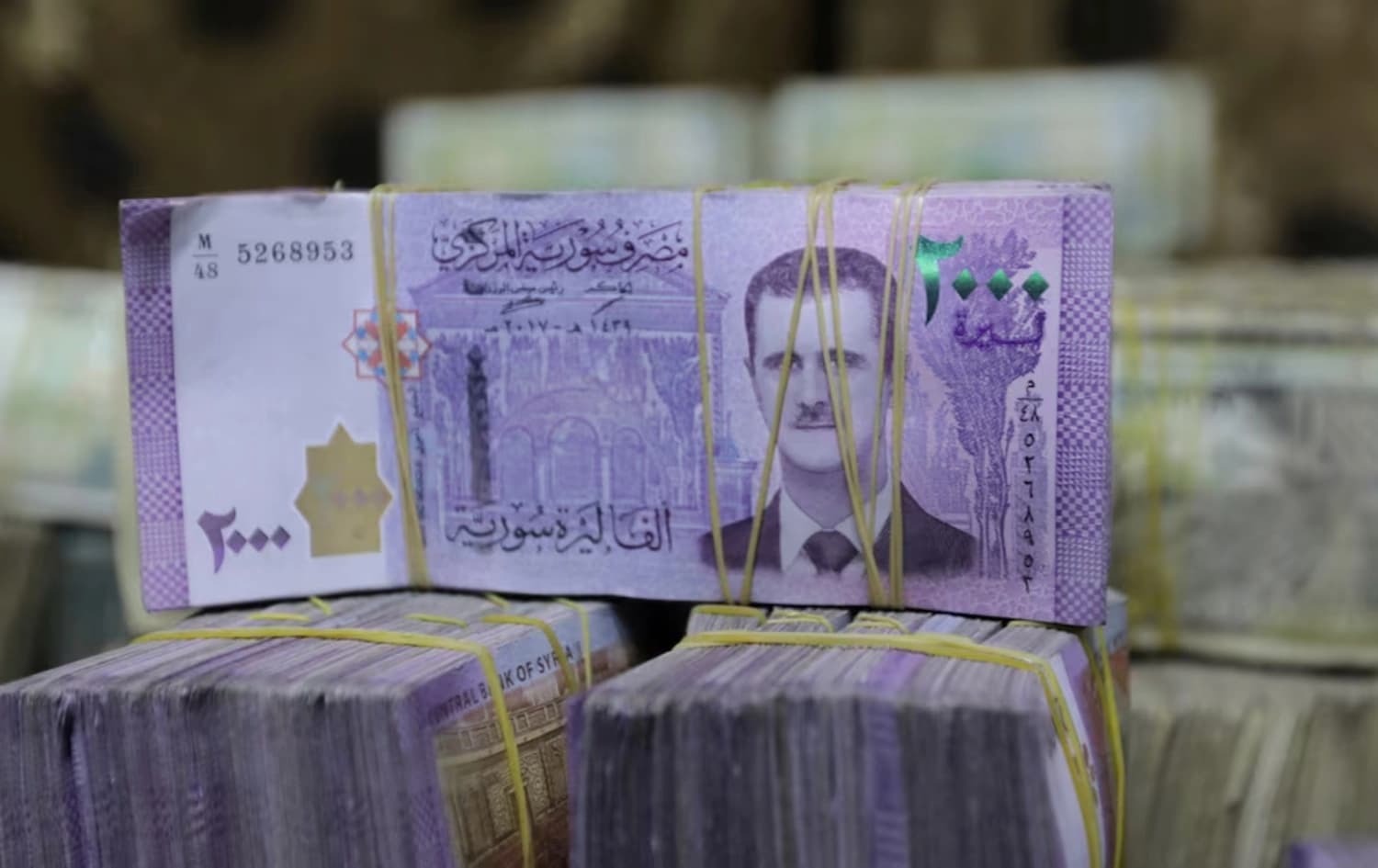 دراوە کۆنەکەی سووریا، وێنەی بەشار ئەسەد، سەرۆکی پێشووی سووریای لەسەرە. وێنە: Reuters