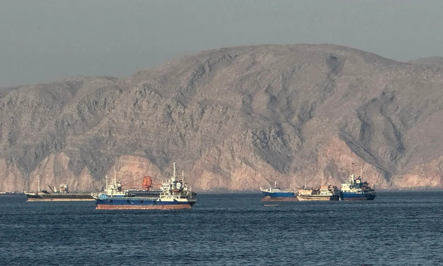Ships anchored in the Strait of Hormuz, off the port city of Khasab on Oman’s northern Musandam Peninsula on May 17, 2026. Photo: AFP