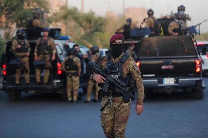 هێزێکی ئەمنی لەسەر شەقامێکی بەغدا. وێنە: AFP