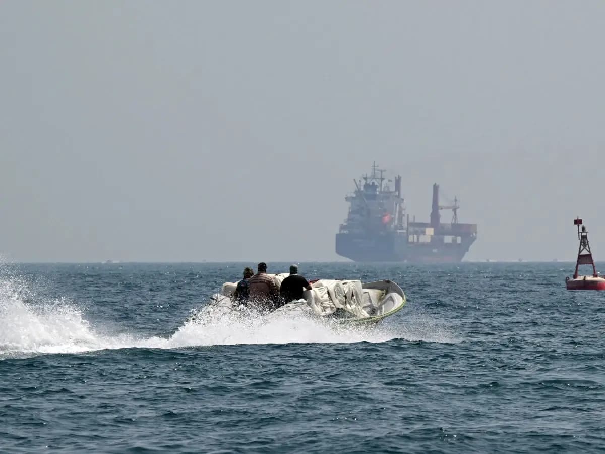 Undated photo of a speed boat and ship in the Bab al Mandab strait. File Photo: AFP