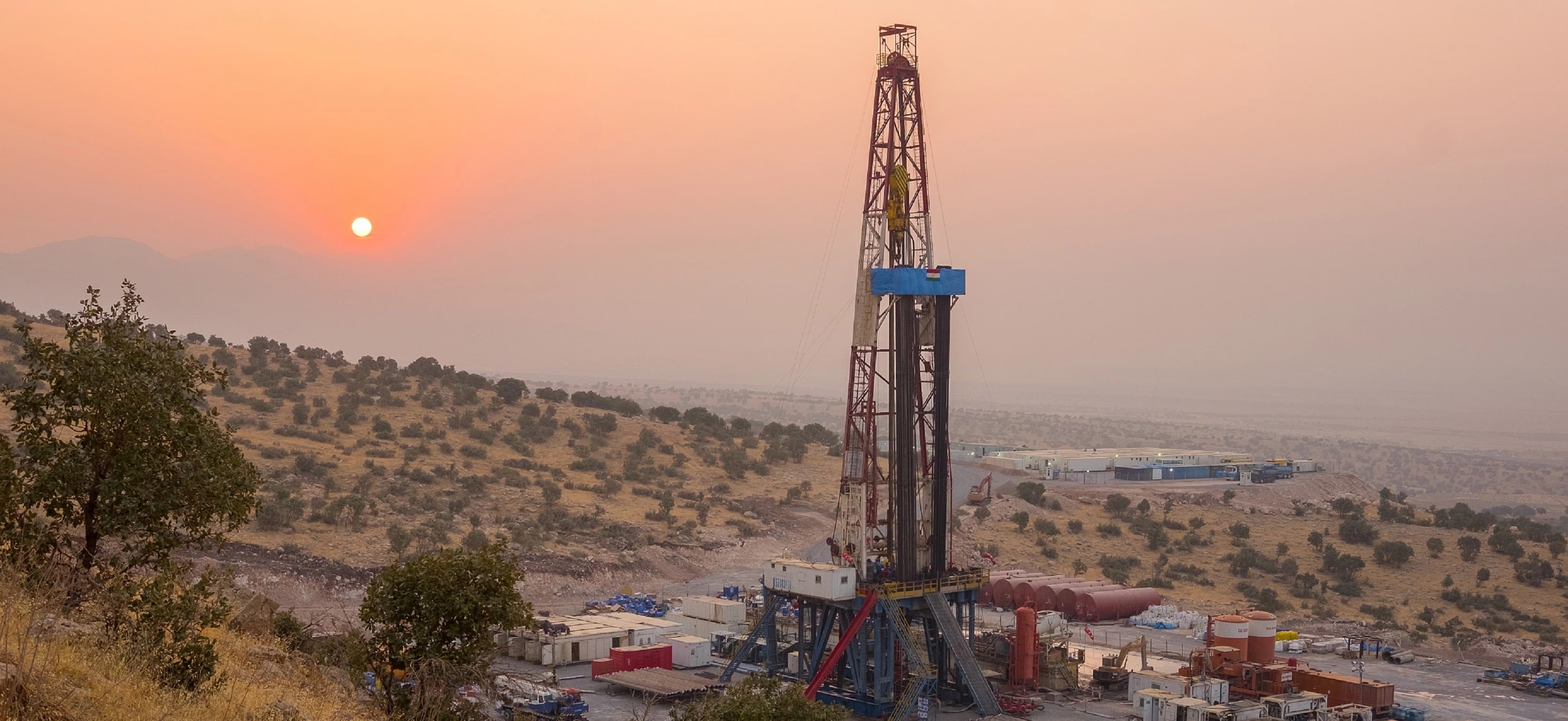 DNO oil drilling rig operating against a mountain sunset in the Kurdistan Region. File photo: DNO ASA