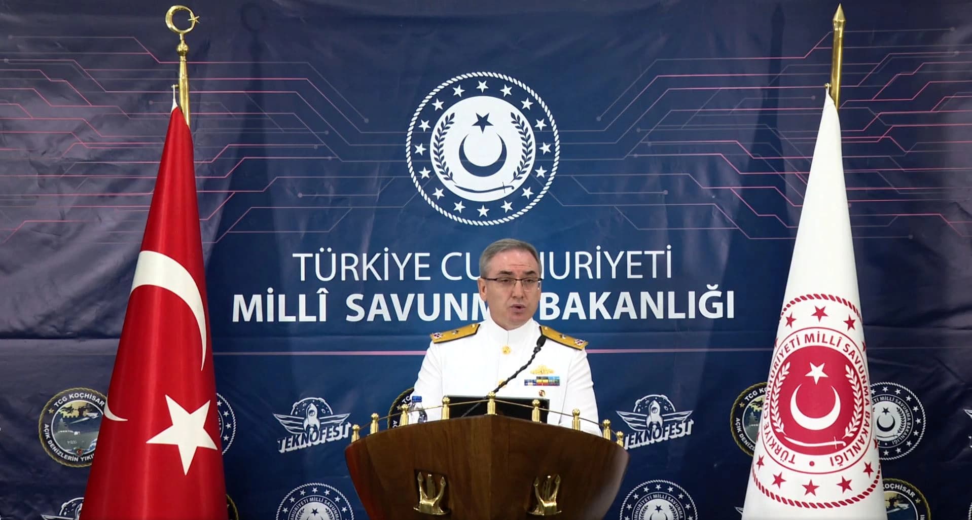 Turkish Defense Ministry spokesperson Admiral Zeki Akturk during a press briefing on the sidelines of TEKNOFEST on August 20, 2026. Photo: Screengrab/Turkish Defense Ministry