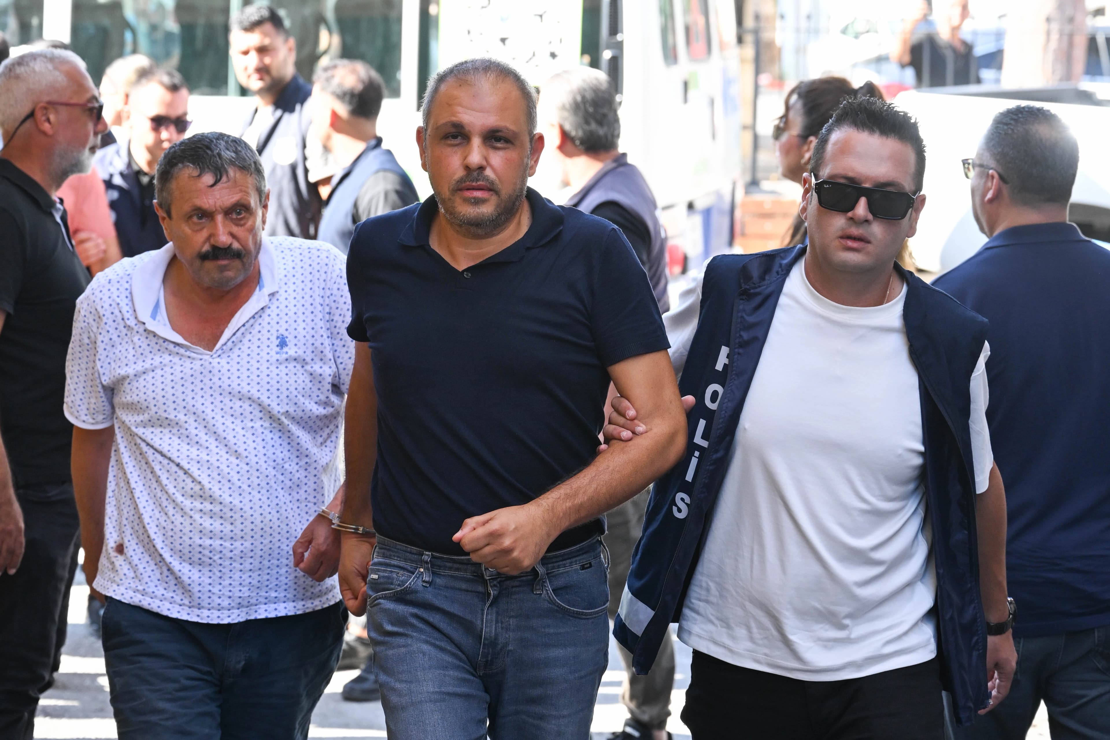 Gözaltına alınan görevliler. / AA
