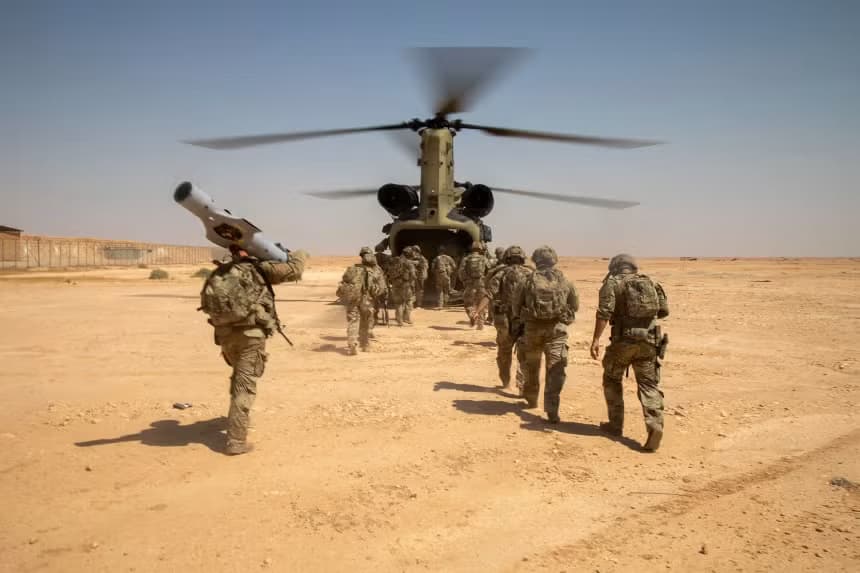 US Army Soldiers, board a CH-47 Chinook helicopter after a live-fire exercise at al-Asad Air Base, Iraq, in July 2023.  Photo: US Army