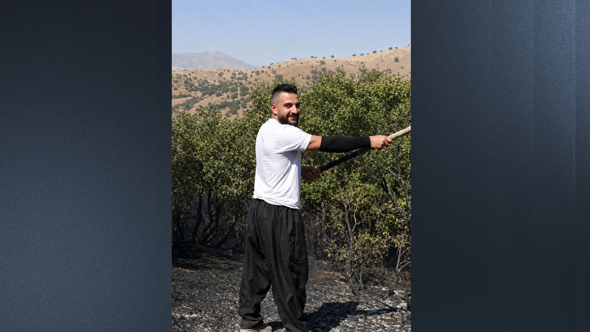 وێنەی گەنجەکە.