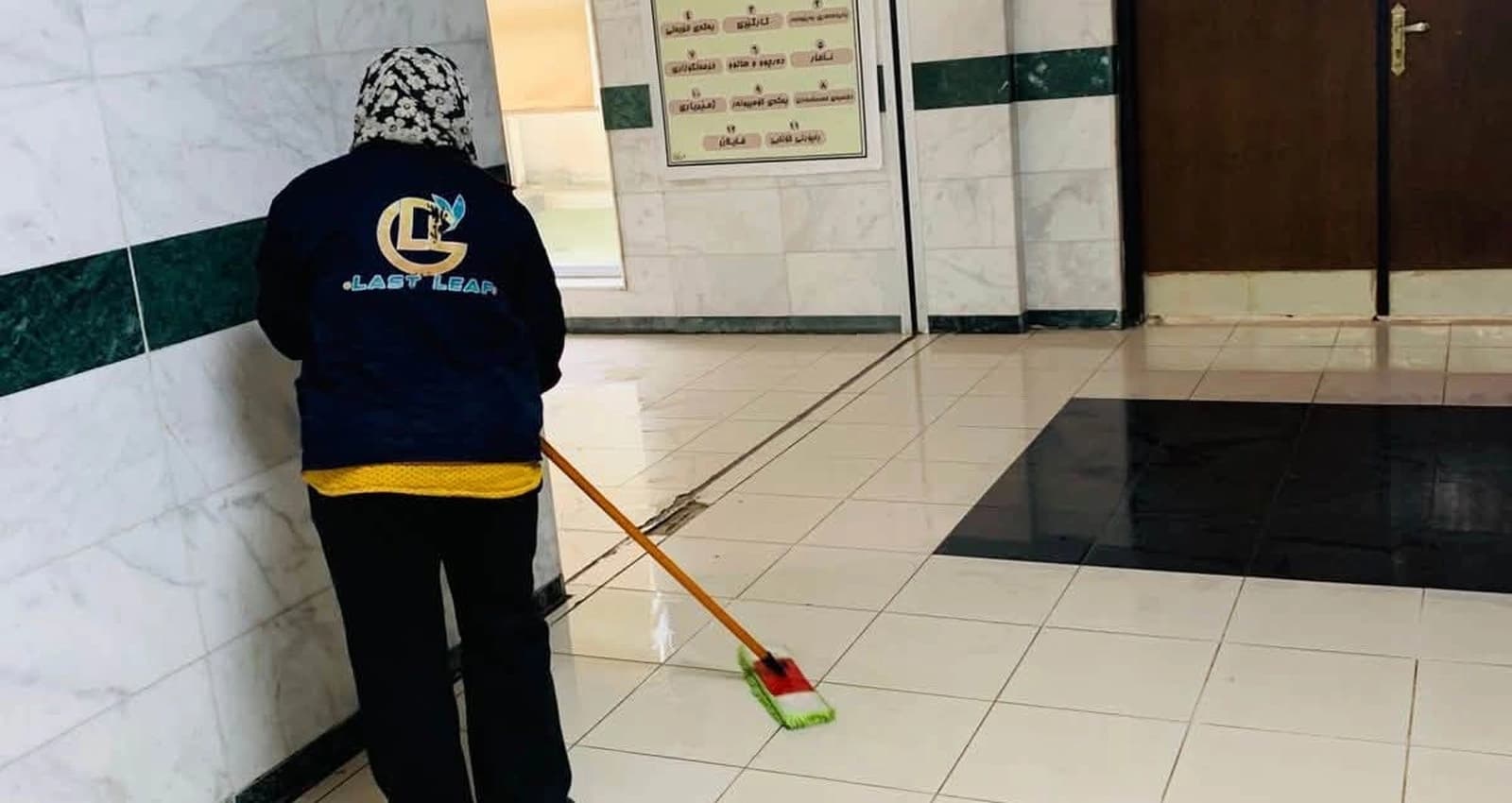 وێنە: ئافرەتێکی کارگوزار لە نەخۆشخانەی شەهید د.خالید لە کۆیە