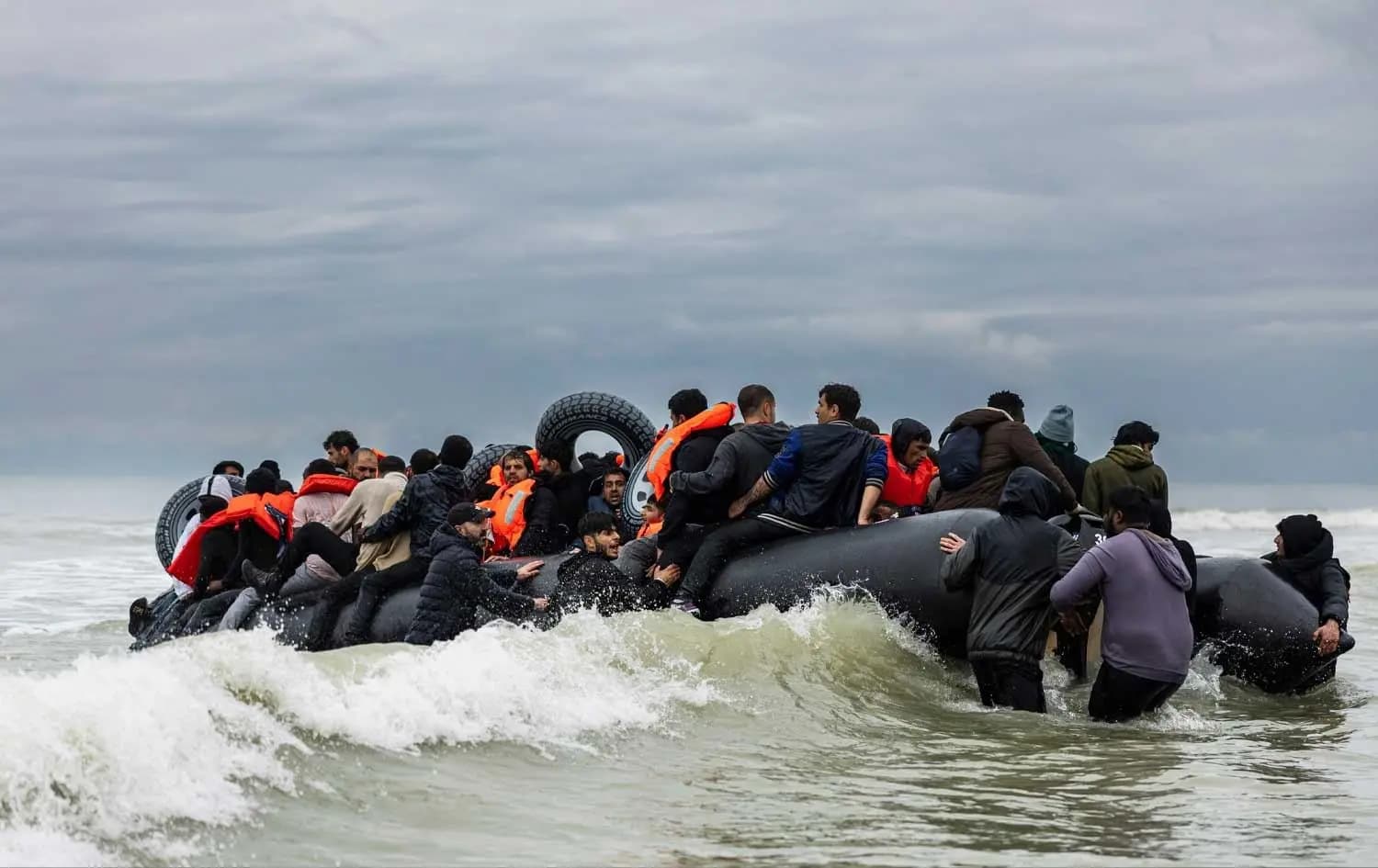 Migrants attempting a dangerous English Channel crossing in a small and overloaded inflatable boat. File photo: AFP