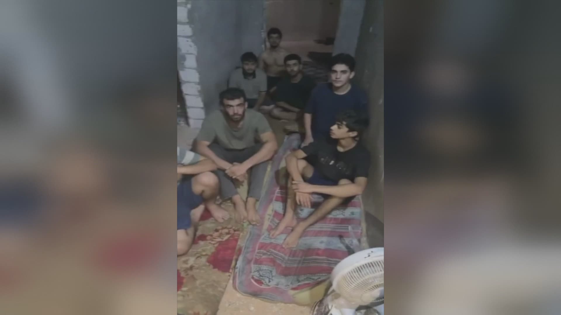 A photo of the ten Kurdish migrants held hostage in Libya. Photo: screengrab/submitted. Date: unknown