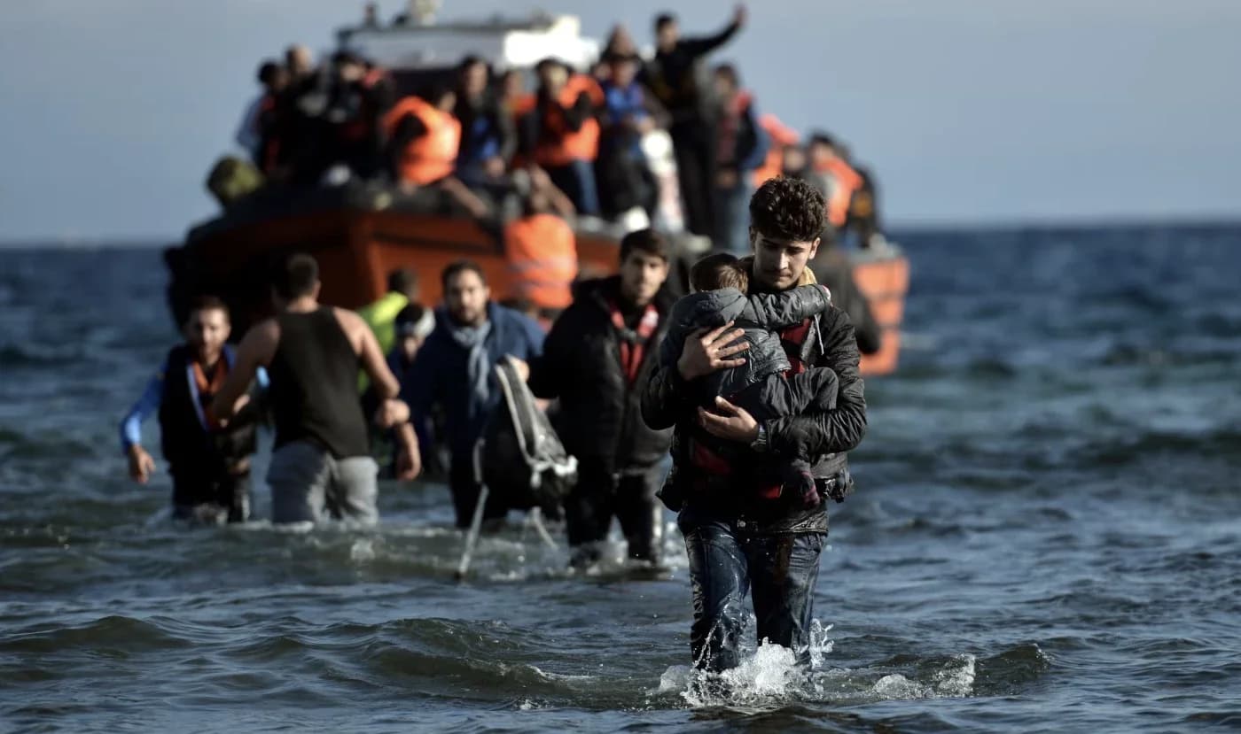 A group of migrants reaching a Greek island. Photo: File/AFP