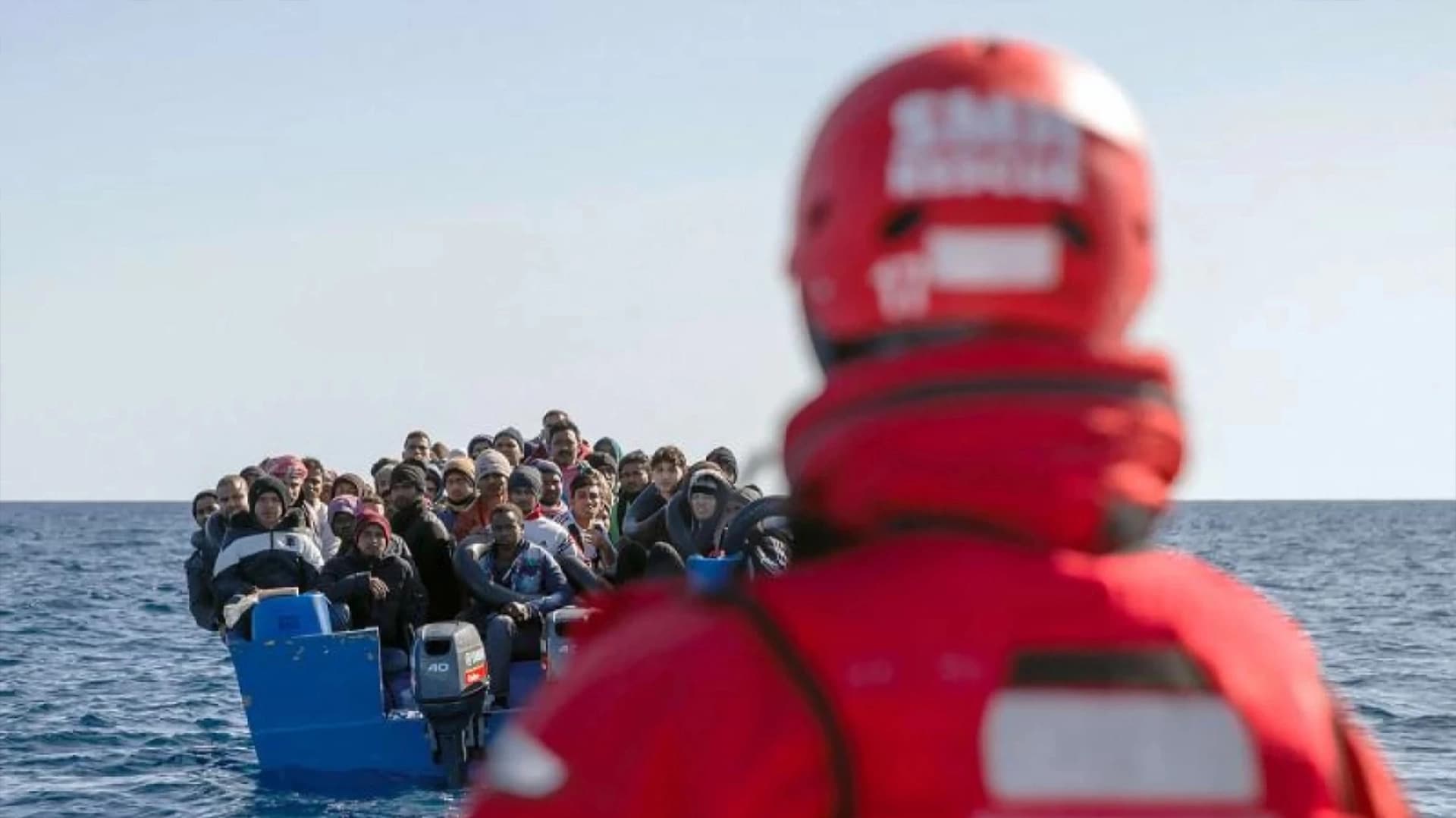 Migrants on a boat in the Mediterranean off the Libyan coast. File Photo: AFP
