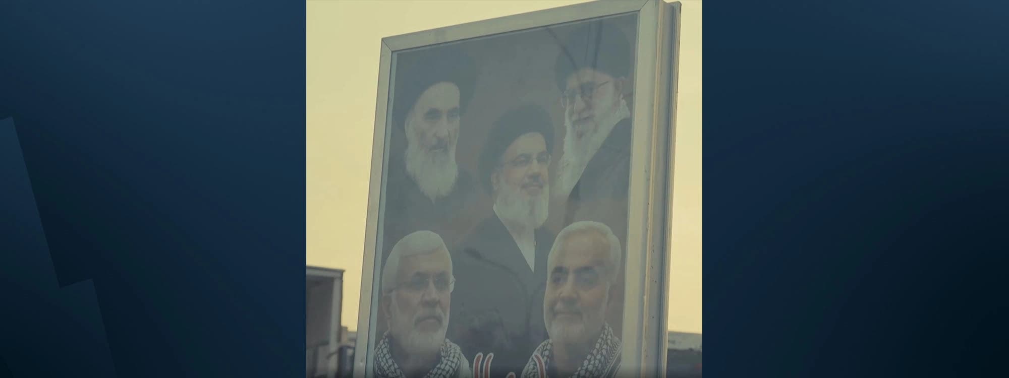 A photo stand on display in Baghdad features slain Hezbollah leader Hassan Nasrallah positioned prominently in the center, alongside Iranian Supreme Leader Ali Khamenei, Grand Ayatollah Ali al-Sistani, Qasem Soleimani, and Abu Mahdi al-Muhandis. Photo: Rudaw/screengrab