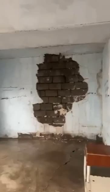 دیمەنێکی دیواری پۆلێکی قوتابخانەکە