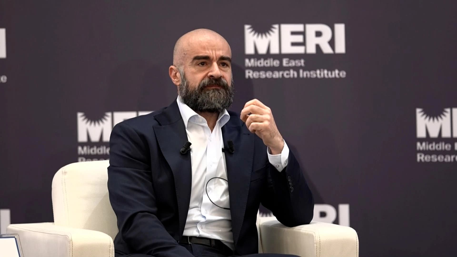 PUK leader Bafel Talabani speaking at a MERI panel in Erbil on Monday. Photo: Screengrab/ Rudaw