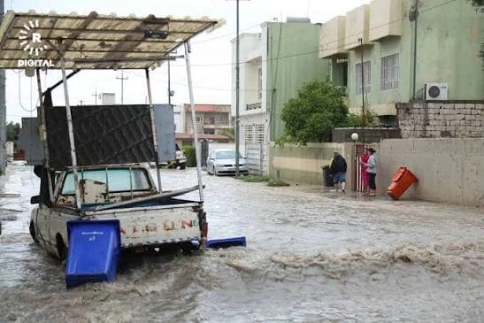 کۆبوونەوەی ئاو لە گەڕەکێکی هەولێر. وێنە: بڵند تاهیر - ئەرشیفی رووداو