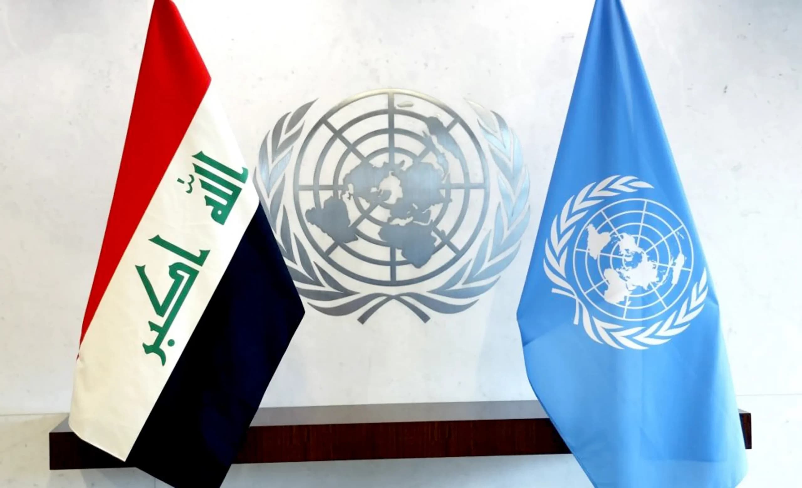 ئاڵای نەتەوە یەکگرتووەکان و عێراق.