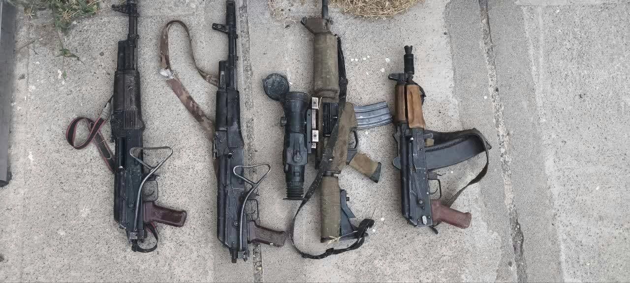 Photo of four firearms allegedly recovered from the scene of the fighting - Iranian state media