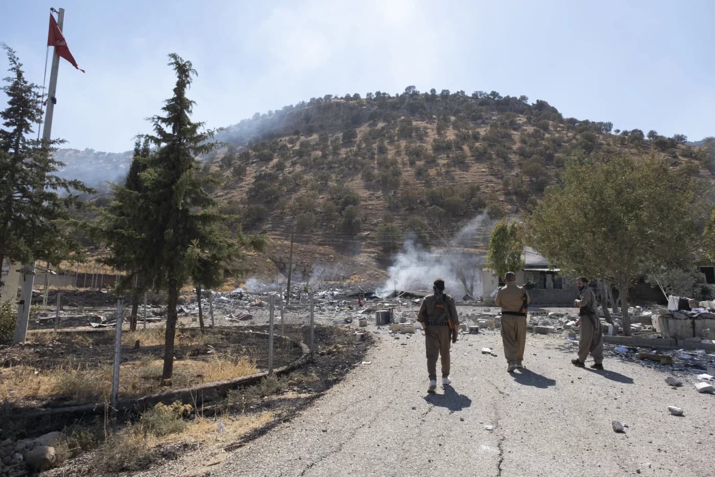 Members of the Iranian-Kurdish Komala party following a drone strike on one of their bases near Sulaimani in 2022. File photo: AP
