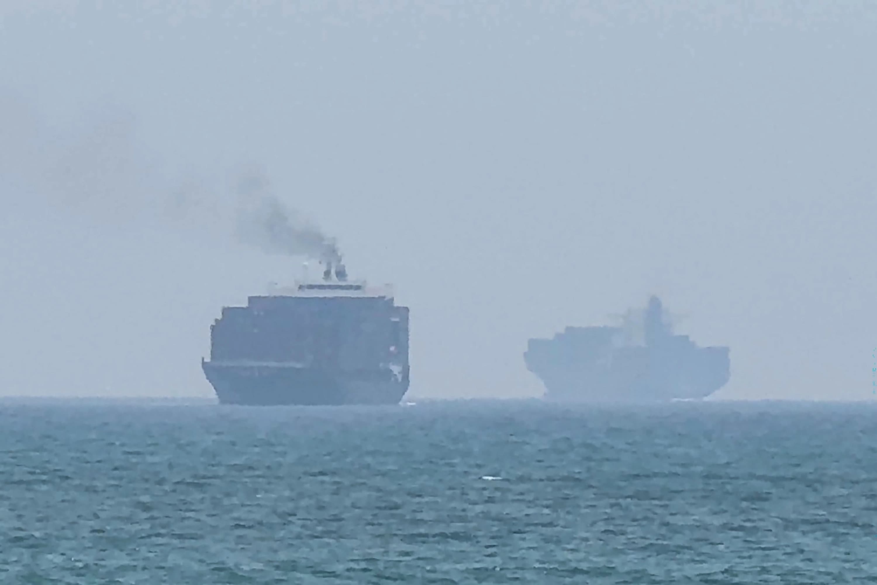 Cargo ships anchoring near the Strait of Hormuz off the eastern coast of the United Arab Emirates at Khor Fakkan on July 12, 2026. Photo: AFP