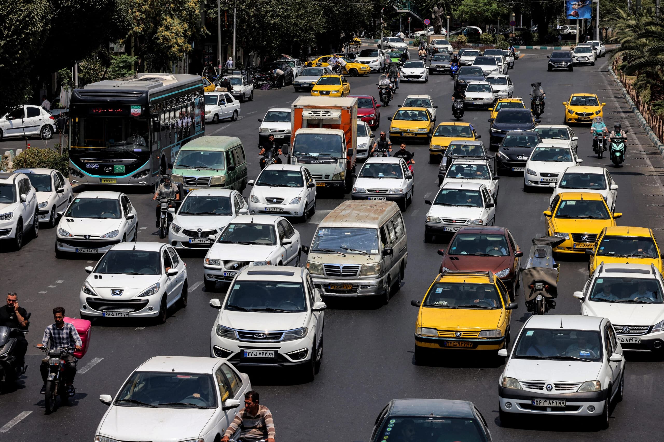 Motorists drive vehicles at Haft-e-Tir Square in central Tehran on August 8, 2026. Photo: AFP