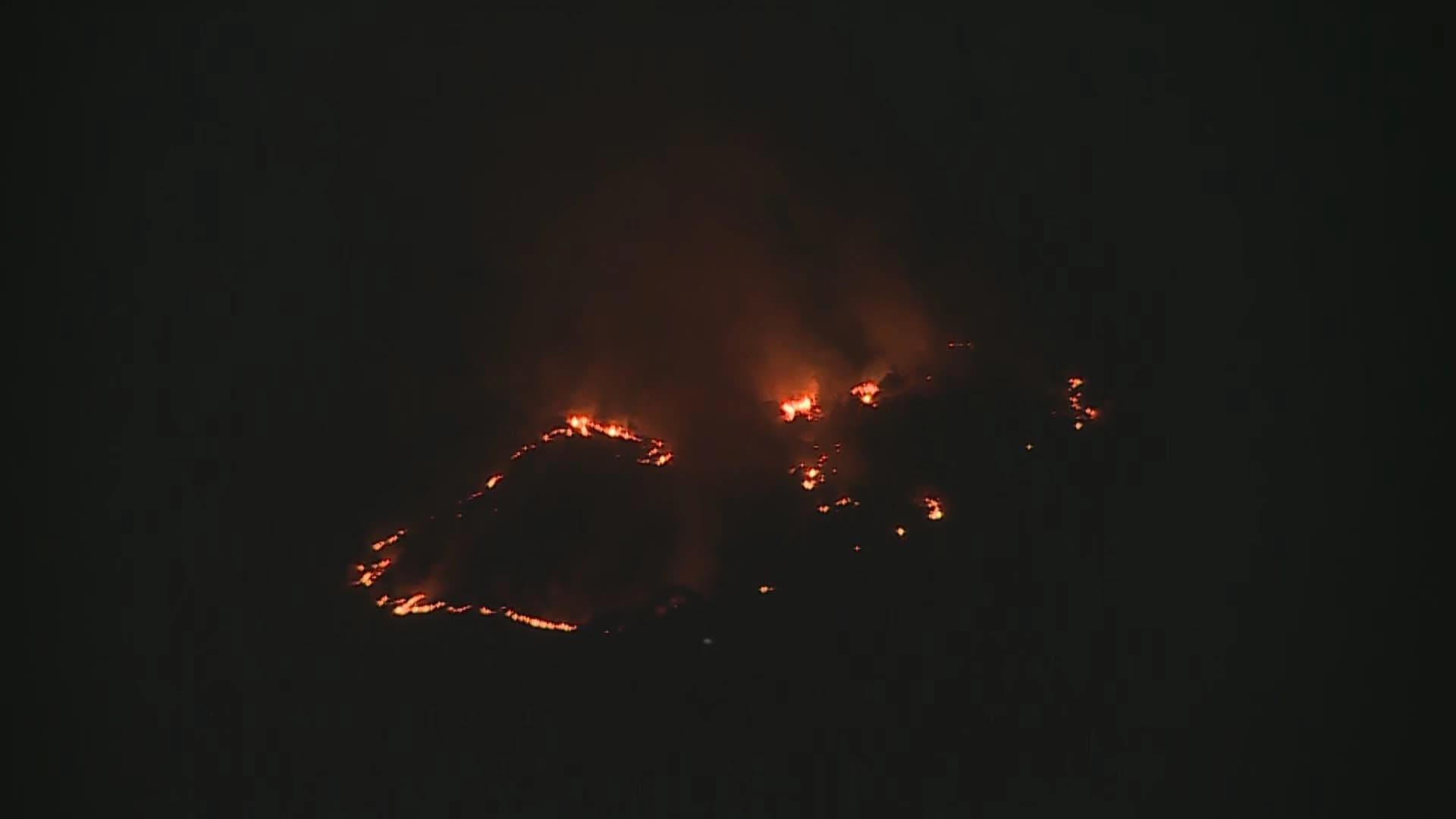A fire burns near a village in Soran, Erbil province, following a suspected missile strike on August 26, 2026. Photo: Screengrab/ Rudaw