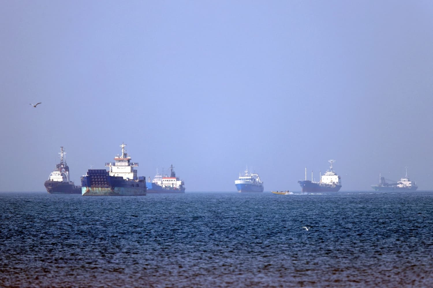 Commercial and cargo vessels navigate the open waters of the Strait of Hormuz. File photo: AFP