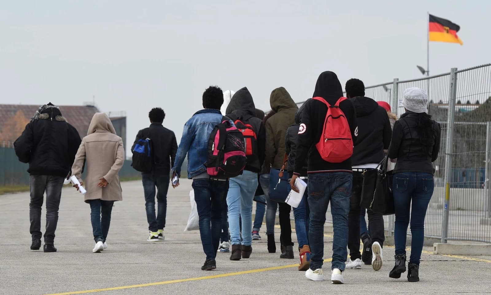 Migrants at a registration center near Munich. File photo: AFP