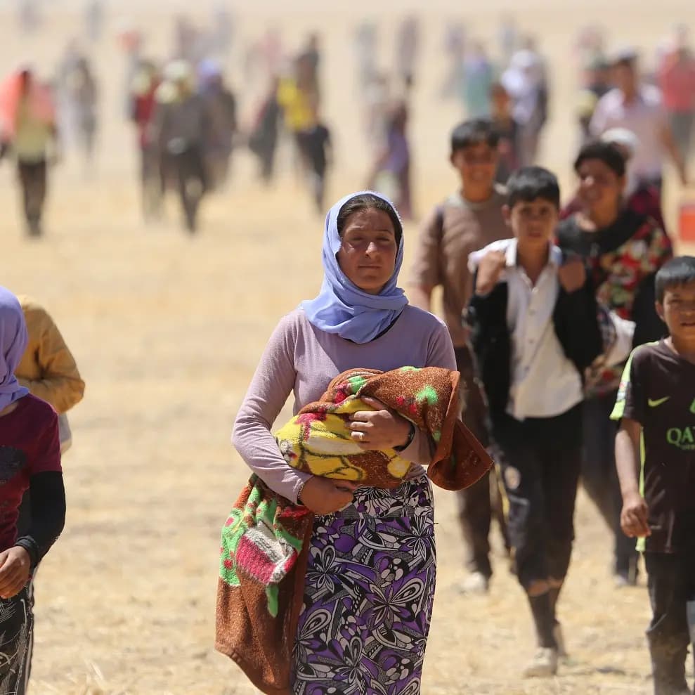 نزوح عوائل إيزدية من سنجار بسبب احتلال داعش لمناطقهم في آب 2014 - ارشيف