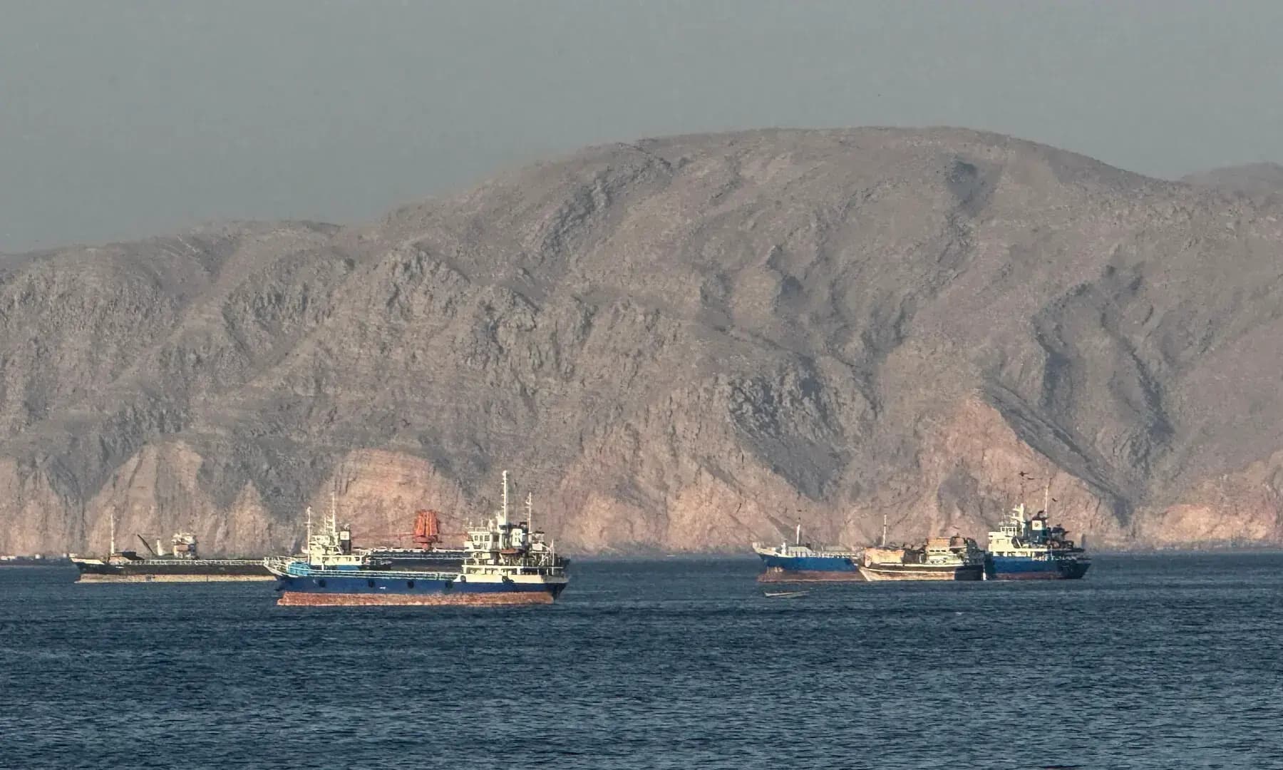 Ships anchored in the Strait of Hormuz, off the port city of Khasab on Oman’s northern Musandam Peninsula on May 17, 2026. Photo: AFP