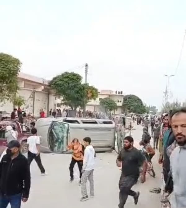 Vehicles vandalized and set on fire amid gunfire and threats preventing the return of Kurdish IDPs. Photo: Screengrab/social media