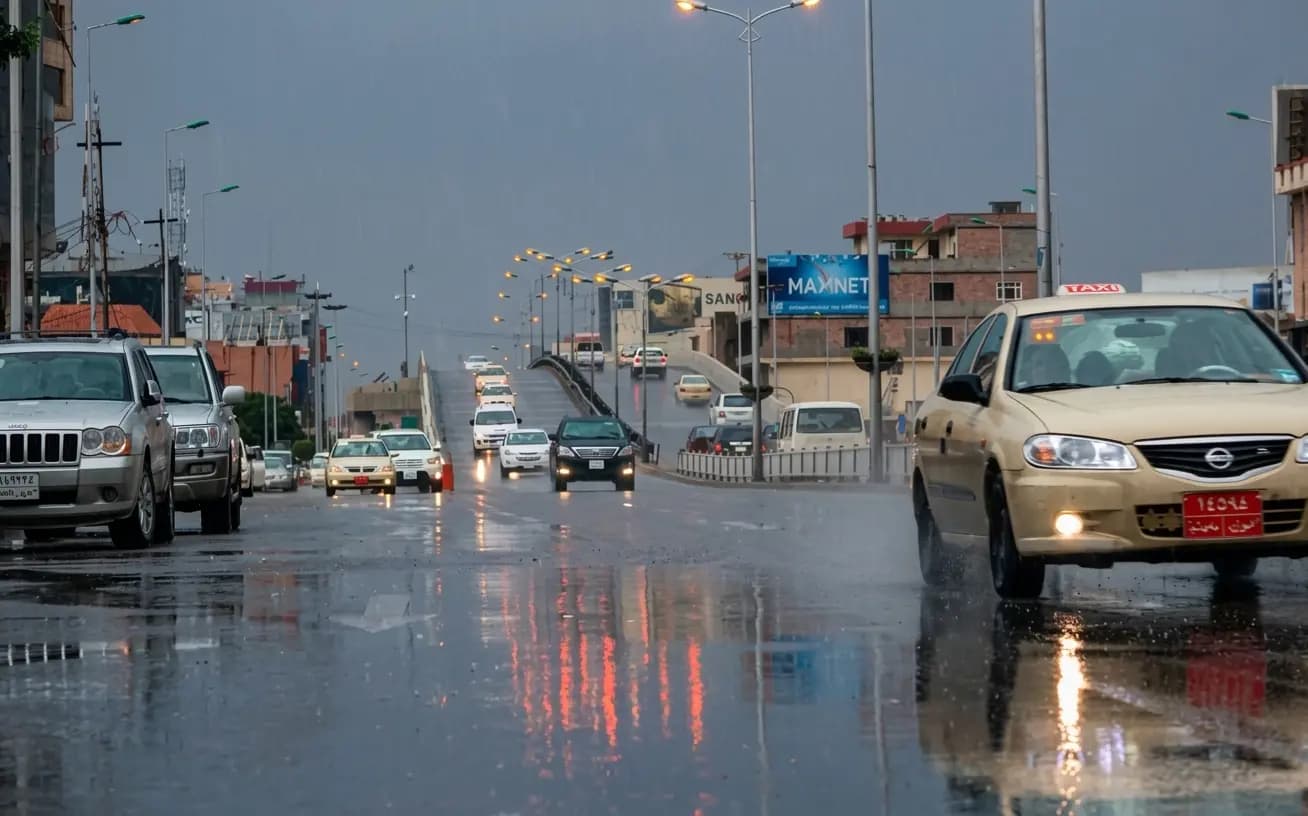 شەقامێکی سلێمانی لە کاتی بارانبارین